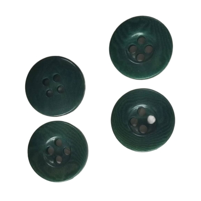 El corozo natural abotona el color verde favorable al medio ambiente y sostenible para la camisa en 24L