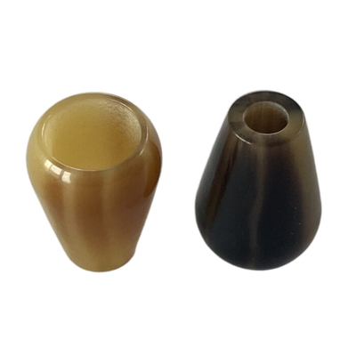 El cordón plástico de lujo termina los botones con tamaño modificado para requisitos particulares efecto del cuerno y colorea uso en el material de la sudadera con capucha DIY