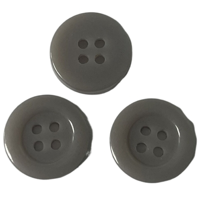 Uso de Grey Color Urea Buttons 15m m en la ropa del bombero que cose la camisa